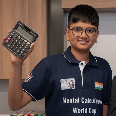 aaryan-shukla-holding-a-calculator-400x400
